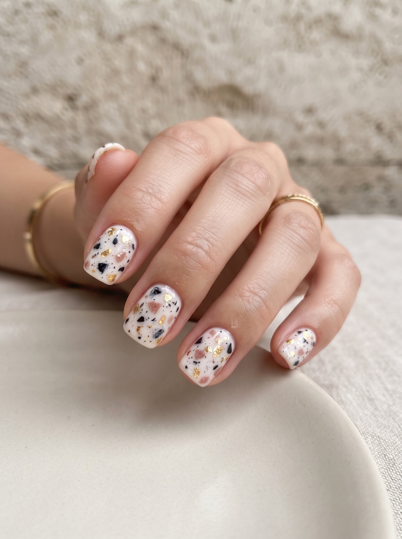2026 trending terrazzo marble nail art design with colorful stone speckles and texture